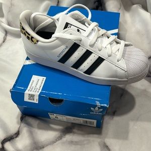 NWT Adidas super star sneakers with cheetah and pink.